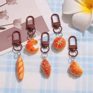 Porte-clés et breloque de sac en résine, réaliste, en forme de desserts 3D (pain, croissant, concha, pain mexicain) et de bougies Farine - Product Image 1