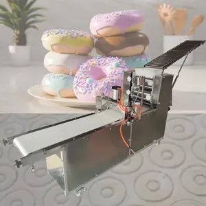 2024 nuevo negocio Croissant hacer pastelería eléctrica automática máquina laminadora de masa de harina de pie puede hacer diferentes formas