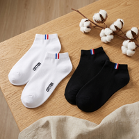 Vente en gros Chaussettes en coton blanc noir Chaussettes de cheville respirantes et absorbant la sueur personnalisées pour femmes et hommes
