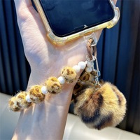 Mode imprimé léopard boule de poils perles téléphone portable porte-clés filles sacs pendentifs voiture porte-clés griffe Machines petits cadeaux
