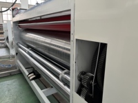 Chargeur de chaîne de carton semi-automatique Boîte en carton ondulé à pizza 2 couleurs Impression flexo Rainurage Prix de la machine de découpe rotative