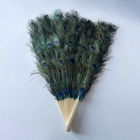 Éventail pliant en plumes de paon en gros pour femmes, accessoire pour spectacle de costumes, fête du thé, décoration de mariage, danse de fête