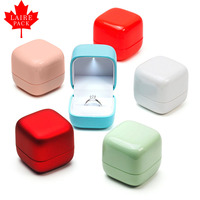 Boîte à bijoux de luxe LAIRE Mini ronde avec surface peinte et éclairage LED, personnalisable avec logo pour l'emballage de bijoux