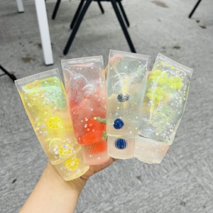 Nouveauté été entrepôt USA : Lot de 72 jouets sensoriels anti-stress souple et scintillant en forme de tube de dentifrice aux fruits, avec boîte cadeau - Product Image 2