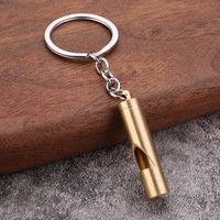 Vente en gros usine Cure-oreille portable en laiton couleur laiton, modèle en forme de balle, porte-clés, tendance nationale