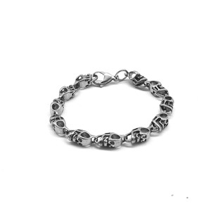 yunnique Pulsera con forma de calavera de acero de titanio, diseño geométrico unisex, joyería de moda - Product Image 5