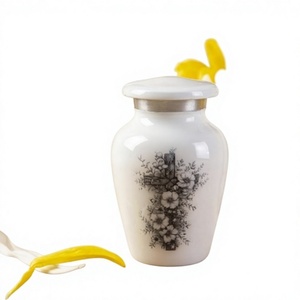 Urna Funeraria de Latón con Grabado de Pájaro en Gris y Dorado para Cenizas - Product Image 1