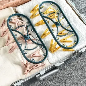 ราวตากผ้าพลาสติก 12 คลิป กันลมอเนกประสงค์ พับได้ สำหรับหอพัก/บ้าน ใช้ตากชุดชั้นใน ถุงเท้า - Product Image 6