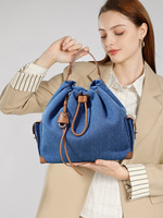 Tas Ransel Wanita Anti Maling Kulit Asli Normcore/Minimalis untuk Komuter Kasual Kapasitas Besar Ringan dengan Tali Serut