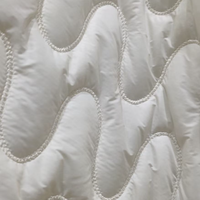 Tissu matelassé imperméable en coton avec motif floral mat épaissi, nouveau tissu en maille de type usine source pour vestes matelassées