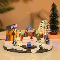 Fibre optique colorée animée rotative scène de Village de Noël résine musicale Led maison de Noël éclairée