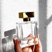 Vente en gros de flacons vaporisateurs transparents noirs et blancs de 50 ml et 100 ml, flacons de parfum avec bouchon à vis, boîte rigide d'emballage