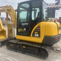 Excavatrice compacte hydraulique sur chenilles Komatsu PC56 d'occasion, équipement de construction