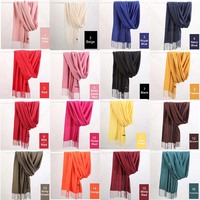 Nouveau luxe femmes gland écharpe chaud bonbons couleur unie imprimé turc émulation cachemire Pashmina châle pour automne hiver