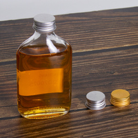 Flacon plat bouteille 200ml 100ml clair mat noir infusion à froid café Kombucha jus Vodka liqueur vin bouteille en verre pour thé