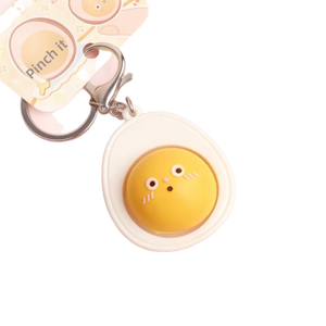 Llavero de simulación con botón de huevo de té, accesorio antiestrés, cara divertida y adorable - Product Image 6
