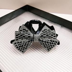 Pince à cheveux de luxe avec nœud papillon, strass scintillants et pince requin en plastique pour femme - Product Image 5