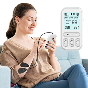 Equipo de fisioterapia TENS/EMS/<span class=keywords><strong>MAS</strong></span> máquina de masaje de unidad TENS inalámbrica masajeador corporal de alivio de fatiga de pulso bajo de doble canal - Product Image 1
