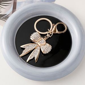 Vàng Kim Loại Kim Cương Rhinestone Thư D Bowknot Bow Quyến Rũ <span class=keywords><strong>Keychain</strong></span> Xe Vòng Chìa Khóa Phụ Kiện Quà Tặng Mặt Dây Chuyền Cho Phụ Nữ Cô Gái Túi Quyến Rũ - Product Image 3