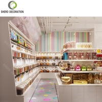 Meubles de comptoir de confiserie colorés et personnalisés, étagères, table de présentation, décoration de boutique de chocolat