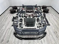Kit carrosserie aérodynamique complet en fibre de carbone pour Mercedes G63 W464 SUV tout-terrain, comprenant des ailes larges, un capot BRABUS et un diffuseur arrière.
