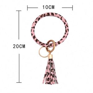 Bracelet porte-clés en cuir léopard effet serpent avec pompon, lot de bracelets porte-clés en gros - Product Image 6