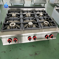 Grill à gaz professionnel en acier inoxydable pour restaurant, avec grilles en fonte robustes et pierres de lave