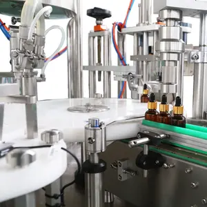 Uçucu yağ flakon pnömatik şişeleme dolum hattı tesisi ekipmanları fabrika üreticisi