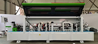 Machine automatique de chantournage et de collage de panneaux à base de bois pour le travail du bois, avec arrondissement des coins et collage de bandes de PVC - Prix