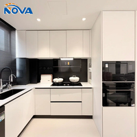 Meuble de cuisine moderne en L, corps en MDF, porte laquée brillante avec panneau d'îlot, vente en gros