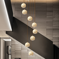 Nouveau lustre en marbre moderne pour villa duplex, lustre long pour escalier, lampe suspendue de luxe, design de salon, luminaires suspendus