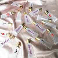 Vente en gros de tubes transparents pour gloss à lèvres de 10 ml et 15 ml, contenants mignons pour baume à lèvres repulpant, étiquette privée, emballage de gloss à lèvres aux fruits à presser