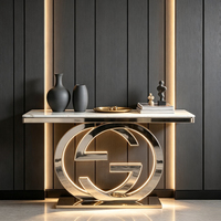 Table console de luxe à double anneau entrelacé avec base sur piédestal, plateau en marbre, table d'entrée en acier inoxydable, table de décoration artistique moderne