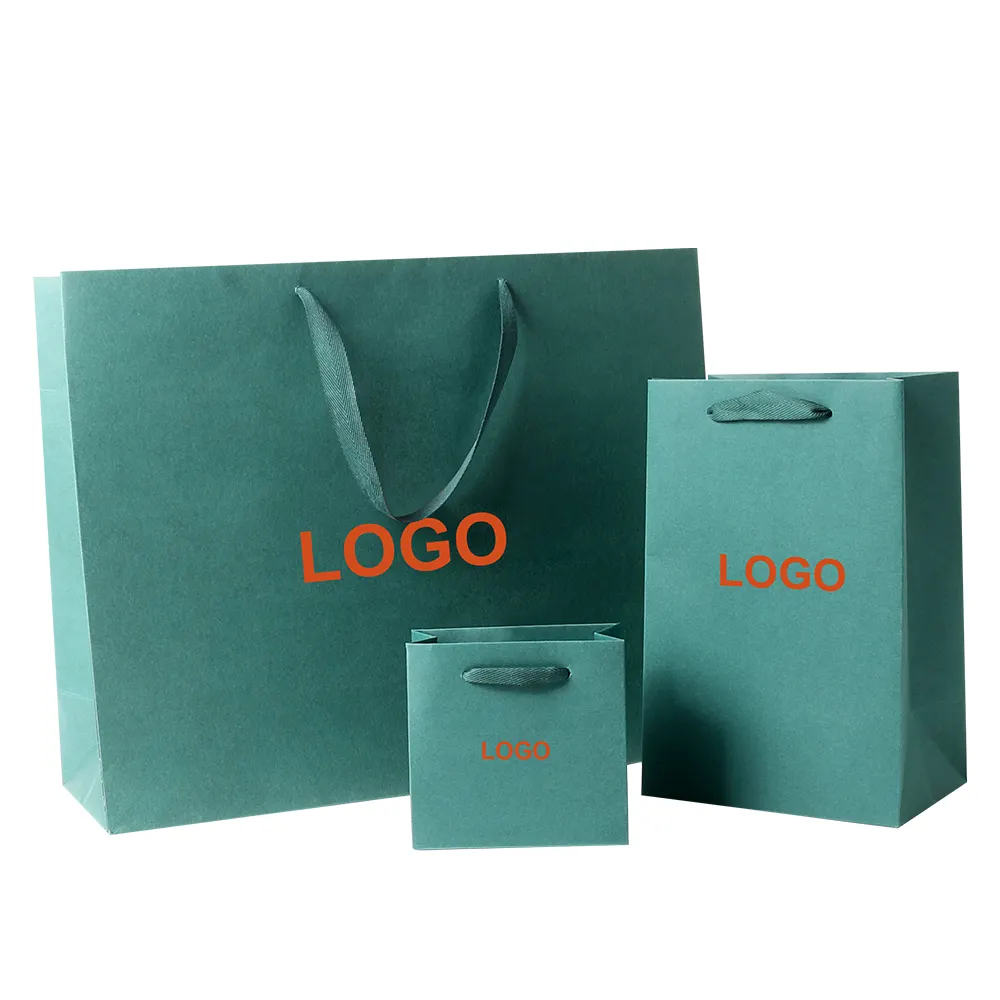 Lüks geri dönüşümlü Kraft kağıt alışveriş çantası özel Logo boya renkli ambalaj hediye veren için özel kağıt ucuz toptan fiyat