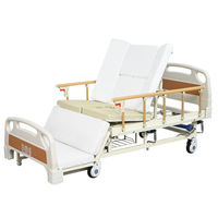 Lit d'allaitement pliable portable pour équipement de rééducation avec découpe de toilette et roues pour patients mobiles