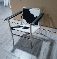 Fauteuil de salon individuel en cuir de vachette minimaliste italien, chaise d'appoint de luxe en acier inoxydable pour salon, café, salle de négociation