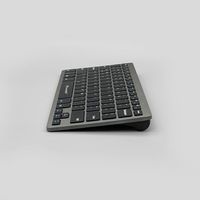 Nouveau clavier sans fil USB BT-001AU 60 % compact, touches ciseaux noires pour smartphone, PC de bureau, OEM, anglais, espagnol