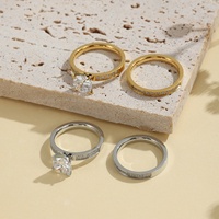 Bague de mariage de luxe confortable en acier inoxydable Yiwu Aceon, sertie de micro-pierres sur les côtés et d'un grand zircon central