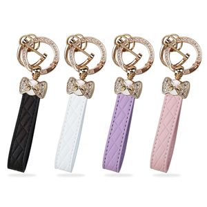 Porte-clés de luxe en cuir véritable avec boucle mate, organisateur de clés, pendentif pour clés de voiture, breloque de sac, porte-clés en strass - Product Image 1