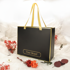 Bolsas de papel de compras de materiales reciclados ecológicos negros personalizados con asa de cinta - Product Image 1