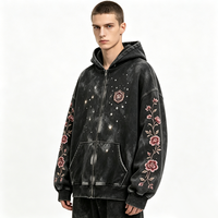 Sweat-shirt à capuche vintage noir délavé avec fermeture éclair, manches à motif floral, broderie, accents en strass, tissu vieilli, fermeture éclair intégrale, style streetwear