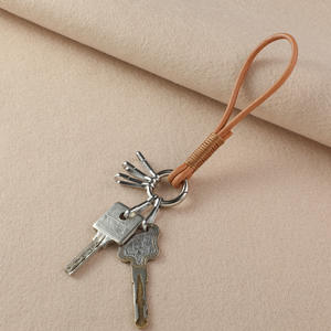 Porte-monnaie <span class=keywords><strong>en</strong></span> corde de cuir tressé à la main Mengda avec boucle fer à cheval <span class=keywords><strong>en</strong></span> alliage de zinc, style luxueux, léger et résistant - Product Image 2