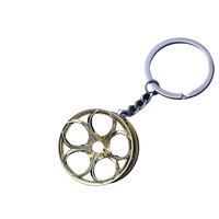 Mini porte-clés de roue de pneu 3D Simulation de roues de course Pièces automobiles Forme de moyeu de voiture Pendentif en alliage de zinc Porte-clés de moyeu de voiture créatif