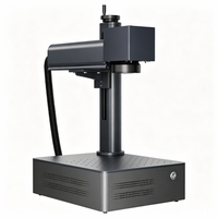 Machine de marquage laser à fibre de bureau Huike 20W, prend en charge la gravure laser personnalisée de motifs graphiques et de textes sur bagues, bracelets et bijoux.
