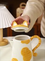 Ensemble de tasses à thé à café et à eau en céramique de conception de dessin animé de chat mignon avec une théière et des ensembles de 4 tasses et soucoupes
