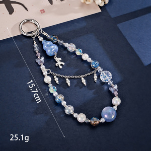 สายคล้อง<span class=keywords><strong>โทรศัพท์</strong></span>มือถือแบบหรูหราประดับลูกปัดรูปตาแมว สายคู่ พร้อมจี้รูปพระจันทร์และม้า ดีไซน์พรีเมียม ป้องกันการตกหล่น ขนาด 18 ซม. หลาก<span class=keywords><strong>สี</strong></span> - Product Image 5