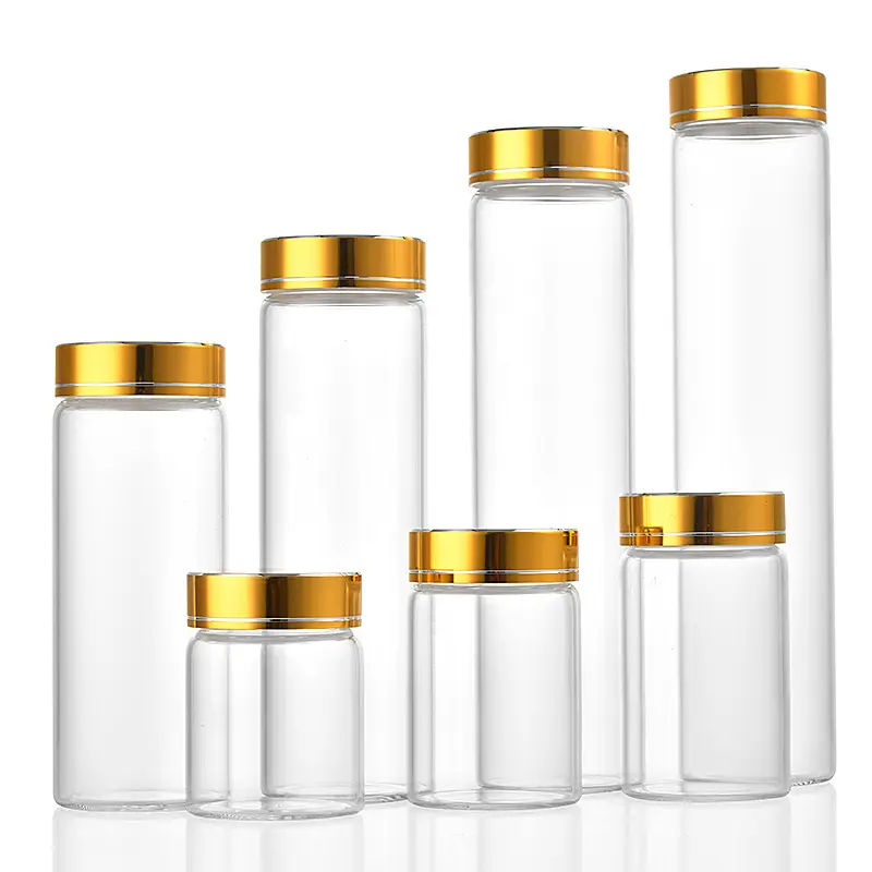 直径47mmの透明なブローチューブガラス瓶、金色のアルミ蓋付きドライグッズ収納ボトル