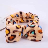 Bandeau de maquillage doux et mignon avec grand nœud motif léopard pour le lavage du visage et la douche, pour filles