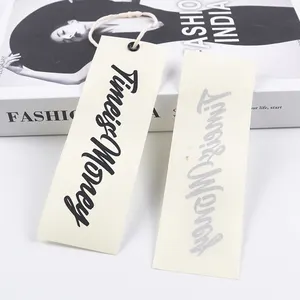 Étiquettes volantes en papier de luxe en carton laser Conception de vêtements professionnels Étiquettes à main en papier personnalisées avec logo de taille personnalisée