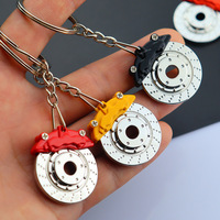 Mini cadeau créatif voiture rotatif disque de frein pendentif accessoires roue jante moyeu Auto anneau Vintage voiture plaquette de frein porte-clés